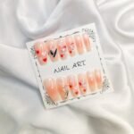 Peach Bliss Gentle Heart Glow Nails with accessories