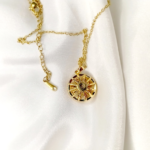 Rotating Flower Necklace Pendant – Golden Stainless Steel Elegance - Image 2