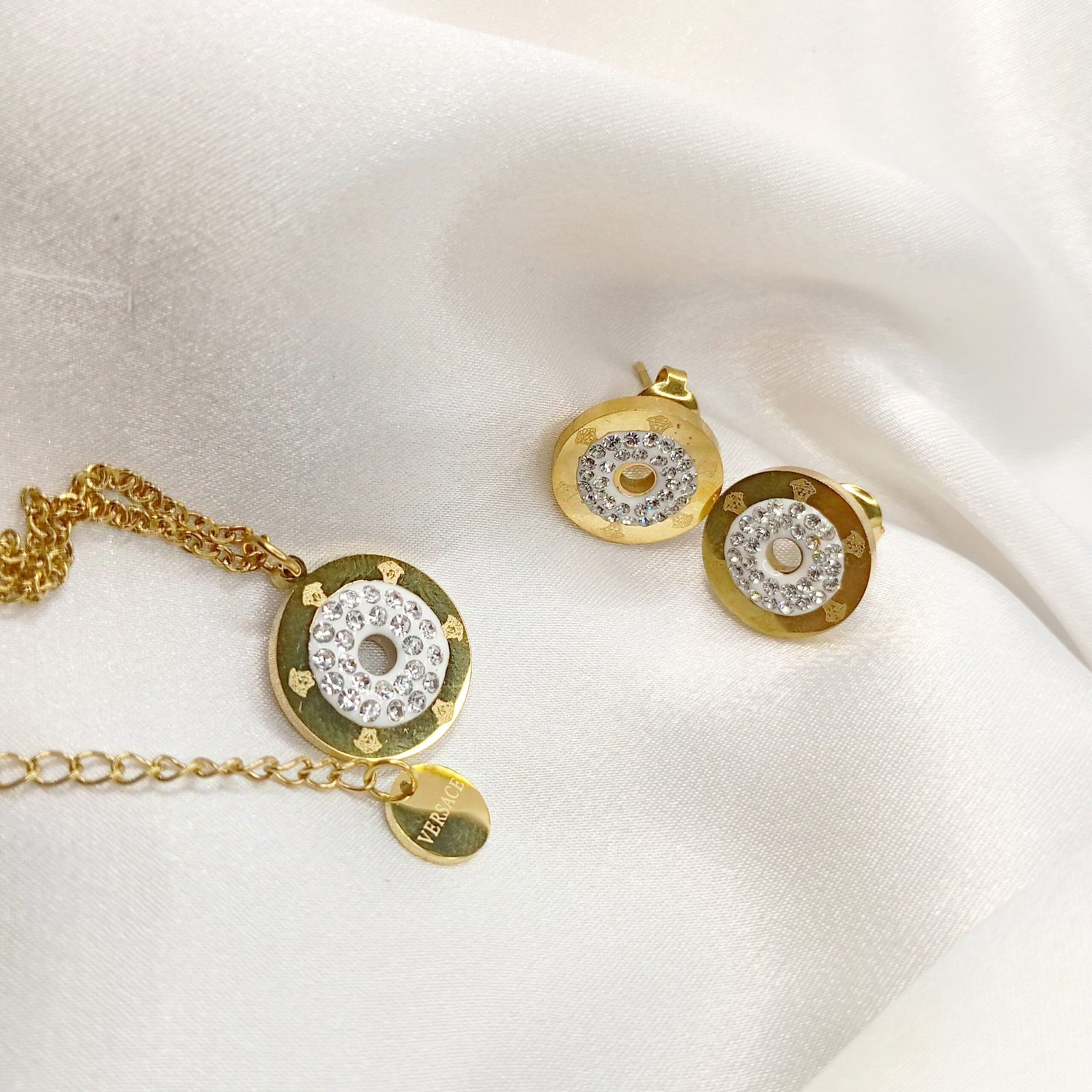 WhatsApp Image 2024-11-13 at 7.16.41 PM VERS-ACE The secret hole pendant with studs Full Zircon - Image 1