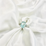 Elegant and timeless,Natural Blue Topaz Bow Ring combines sophistication with charm. Crafted from 925 sterling silver, it features an exquisite oval-cut blue topaz gemstone accentuated by a graceful bow design. Perfect for engagements, weddings, or as a statement accessory. - Image 2
